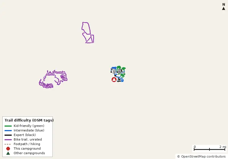 Map of roads, water and trails within about 5 miles of Alafia River State Park Campground, with bike trails colored by their OpenStreetMap difficulty tags