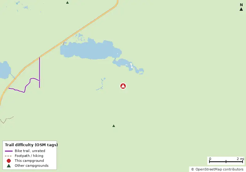 Map of roads, water and trails within about 5 miles of Alligator Creek Campsite, with bike trails colored by their OpenStreetMap difficulty tags