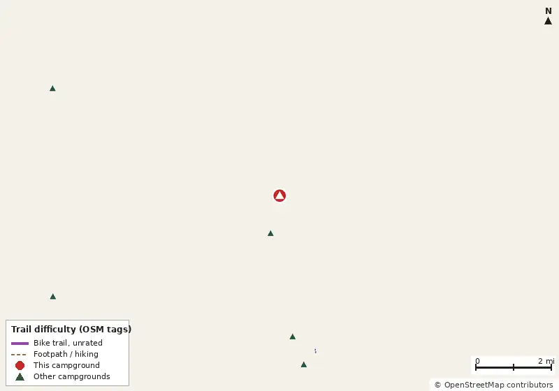 Map of roads, water and trails within about 5 miles of Anastasia State Park Campground, with bike trails colored by their OpenStreetMap difficulty tags