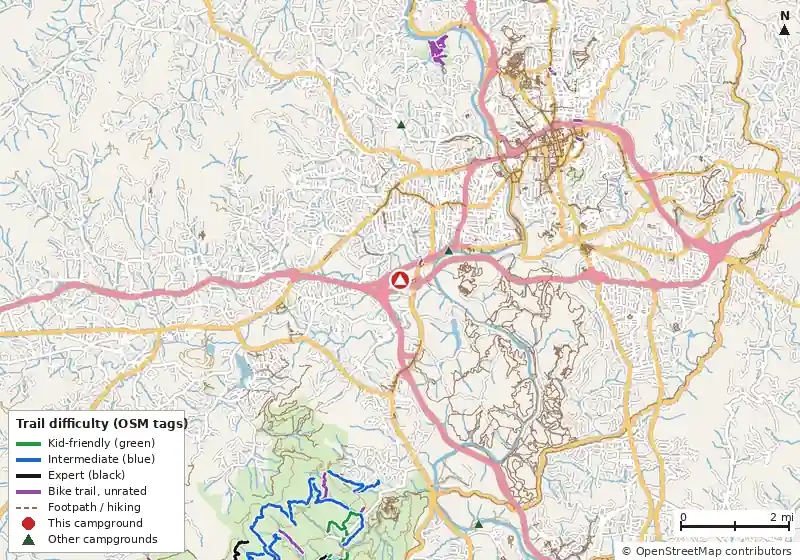 Map of roads, water and trails within about 5 miles of Asheville Bear Creek RV Park and Campground, with bike trails colored by their OpenStreetMap difficulty tags
