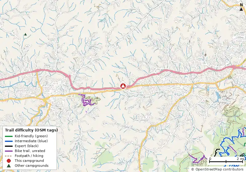 Map of roads, water and trails within about 5 miles of Asheville West KOA Holiday, with bike trails colored by their OpenStreetMap difficulty tags