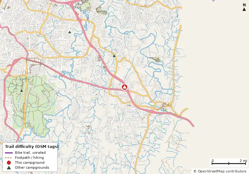 Map of roads, water and trails within about 5 miles of Battlefield Campground & RV Park, with bike trails colored by their OpenStreetMap difficulty tags
