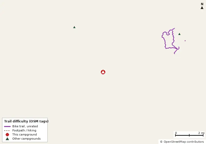 Map of roads, water and trails within about 5 miles of Bear Creek Marina Campground, with bike trails colored by their OpenStreetMap difficulty tags