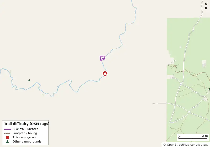 Map of roads, water and trails within about 5 miles of Big Shoals State Park Campground, with bike trails colored by their OpenStreetMap difficulty tags
