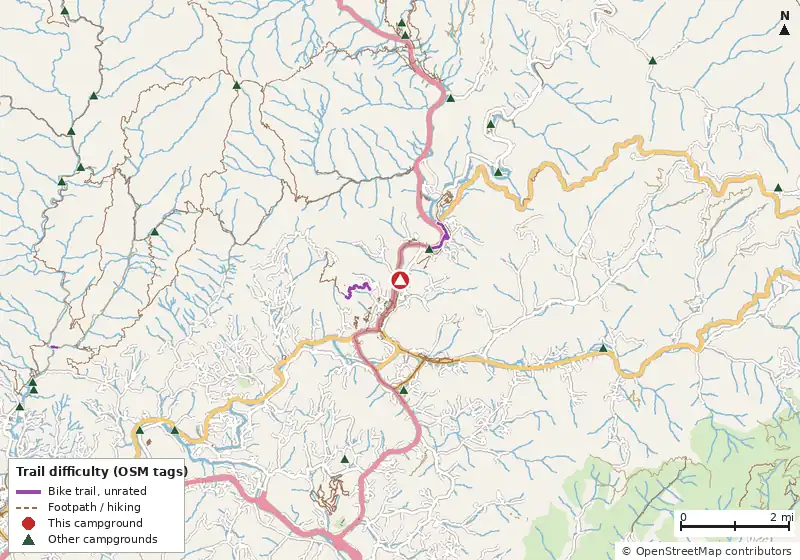 Map of roads, water and trails within about 5 miles of Bradley's Campground, with bike trails colored by their OpenStreetMap difficulty tags