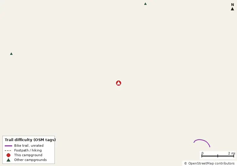 Map of roads, water and trails within about 5 miles of Camp Margaritaville Auburndale, with bike trails colored by their OpenStreetMap difficulty tags