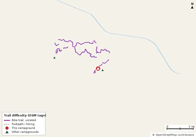 Map of roads, water and trails within about 5 miles of Campground 1, with bike trails colored by their OpenStreetMap difficulty tags