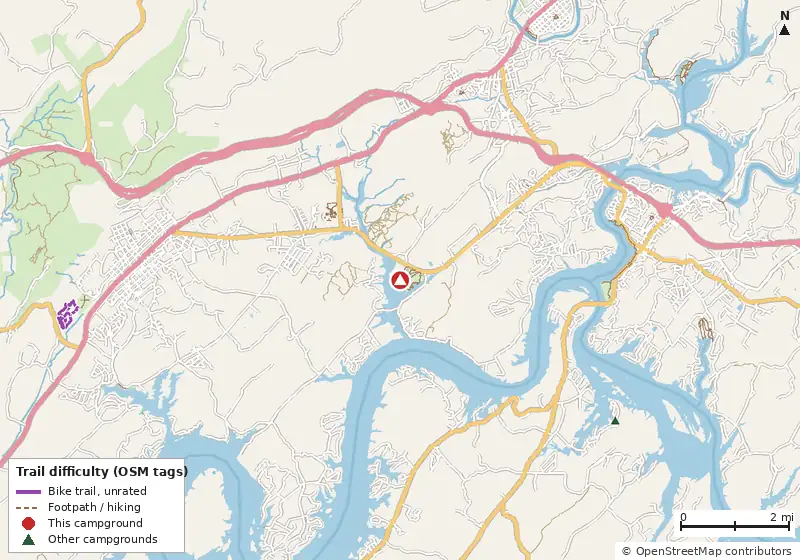 Map of roads, water and trails within about 5 miles of Caney Creek RV Resort, with bike trails colored by their OpenStreetMap difficulty tags