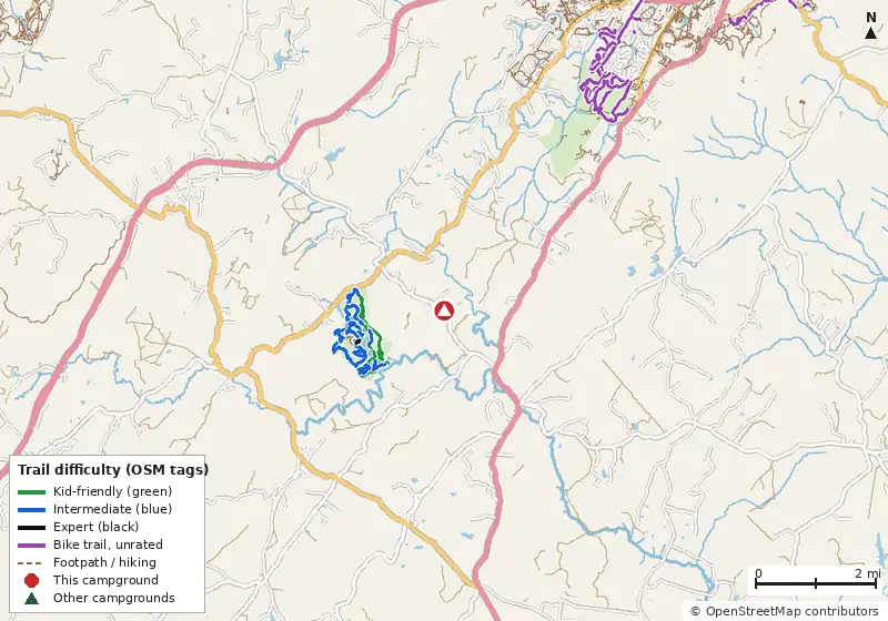 Map of roads, water and trails within about 5 miles of Charlottesville KOA Holiday, with bike trails colored by their OpenStreetMap difficulty tags