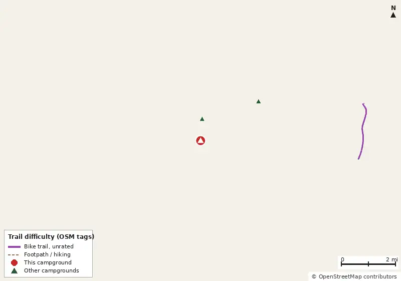 Map of roads, water and trails within about 5 miles of Coastal Georgia RV Resort, with bike trails colored by their OpenStreetMap difficulty tags
