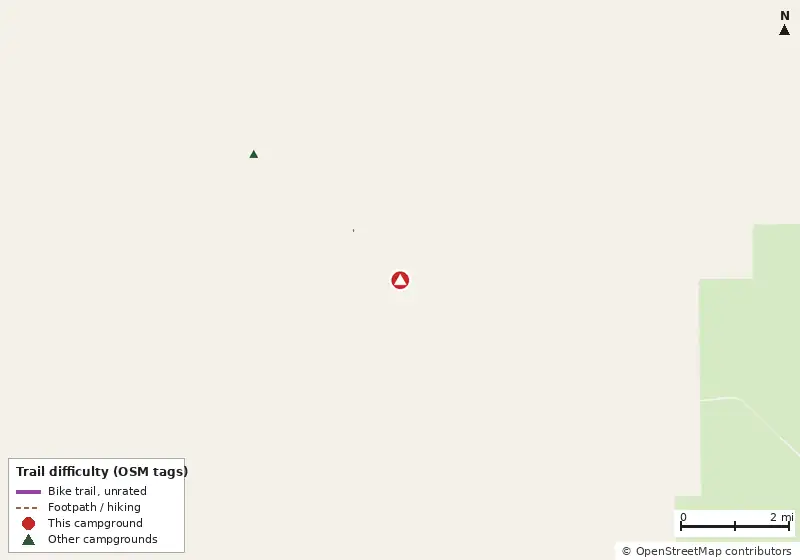 Map of roads, water and trails within about 5 miles of Collier-Seminole State Park Campground, with bike trails colored by their OpenStreetMap difficulty tags