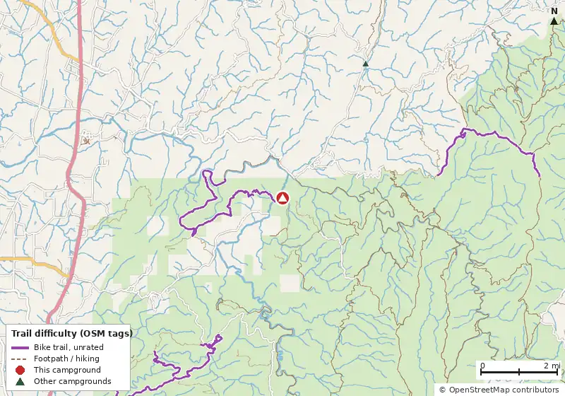 Map of roads, water and trails within about 5 miles of Cottonwood Patch Campground, with bike trails colored by their OpenStreetMap difficulty tags