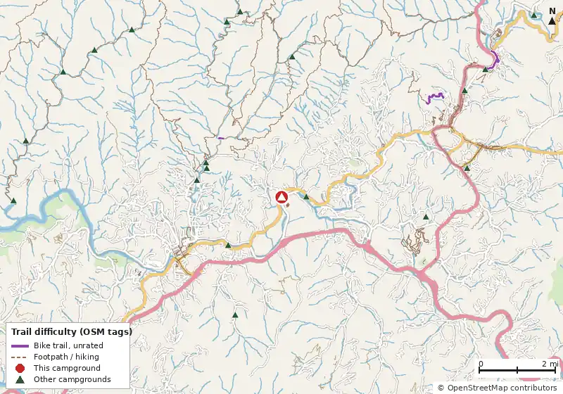 Map of roads, water and trails within about 5 miles of Country Girls RV Park, with bike trails colored by their OpenStreetMap difficulty tags