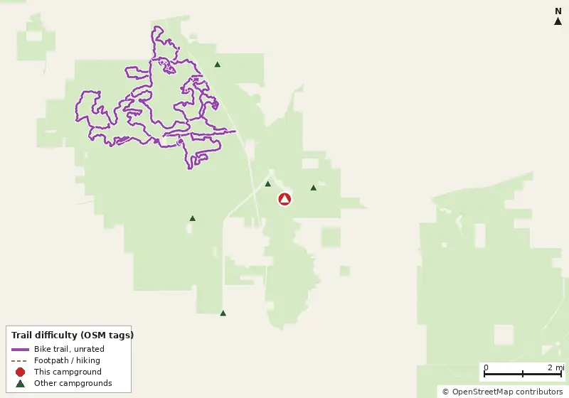 Map of roads, water and trails within about 5 miles of Cypress Glen Campground, with bike trails colored by their OpenStreetMap difficulty tags