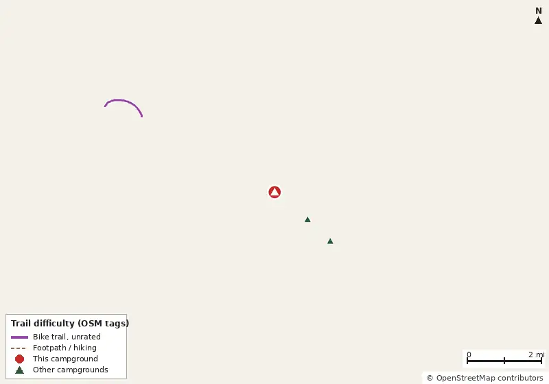 Map of roads, water and trails within about 5 miles of Cypress Harbor 55+, with bike trails colored by their OpenStreetMap difficulty tags