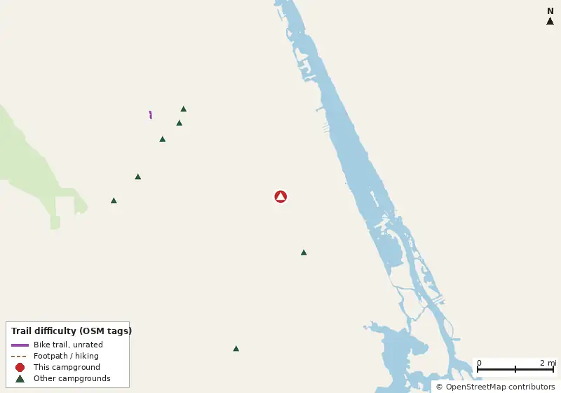 Map of roads, water and trails within about 5 miles of Daytona RV Park, with bike trails colored by their OpenStreetMap difficulty tags