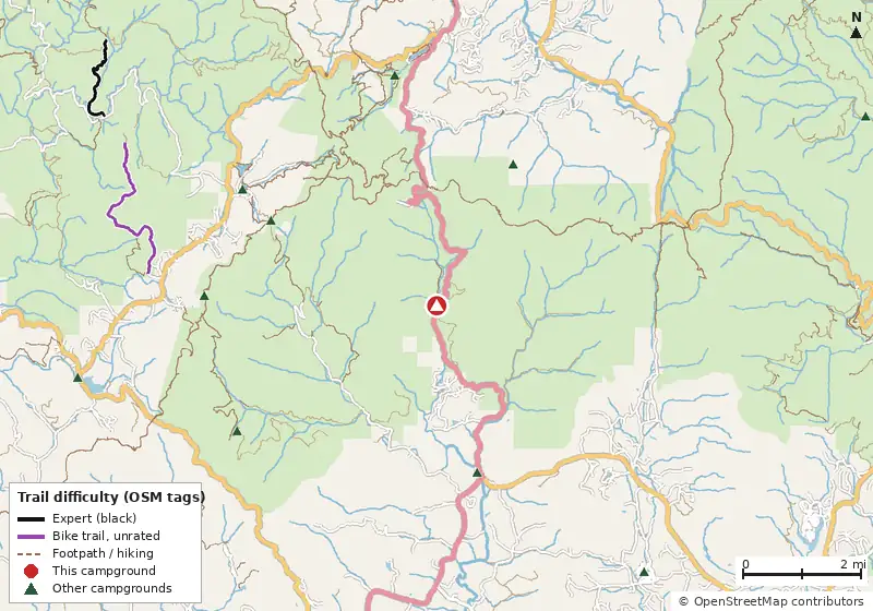 Map of roads, water and trails within about 5 miles of Desoto Falls Recreation Area, with bike trails colored by their OpenStreetMap difficulty tags
