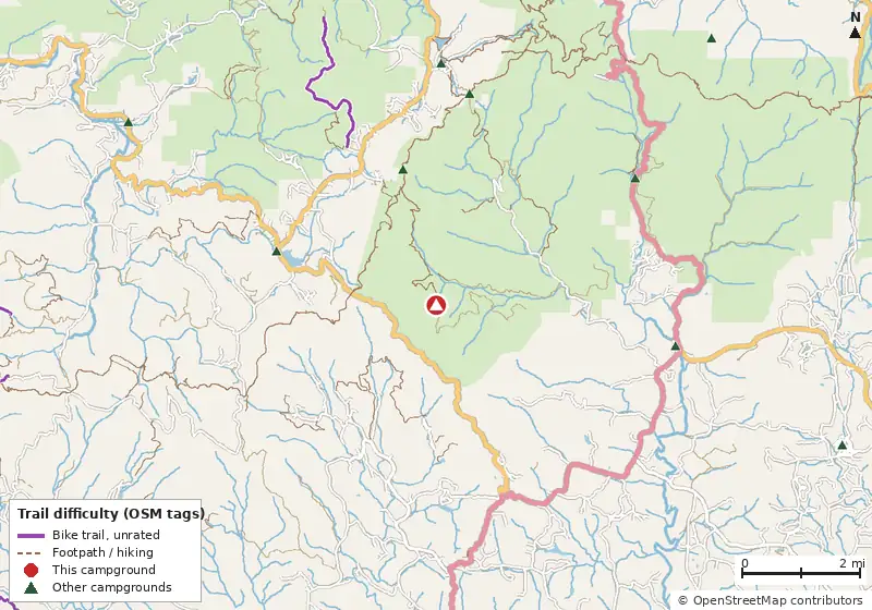 Map of roads, water and trails within about 5 miles of Dockery Lake Campground, with bike trails colored by their OpenStreetMap difficulty tags