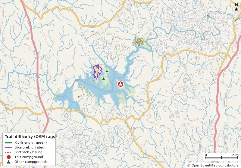 Map of roads, water and trails within about 5 miles of Doll Mountain Campground, with bike trails colored by their OpenStreetMap difficulty tags