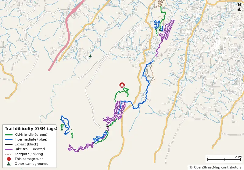 Map of roads, water and trails within about 5 miles of Durham Backcountry Campsite, with bike trails colored by their OpenStreetMap difficulty tags