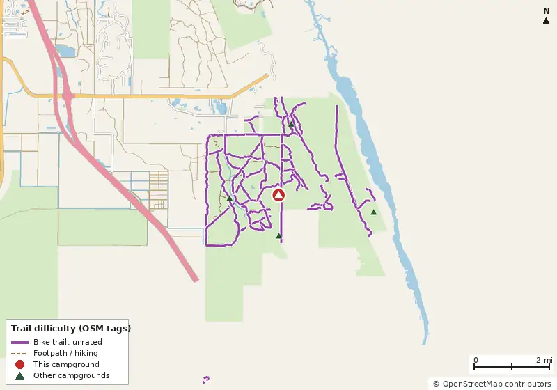 Map of roads, water and trails within about 5 miles of Eaglesview Equestrian Camp, with bike trails colored by their OpenStreetMap difficulty tags