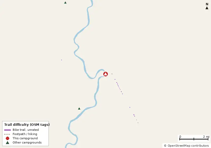 Map of roads, water and trails within about 5 miles of Fanning Springs State Park Campground, with bike trails colored by their OpenStreetMap difficulty tags