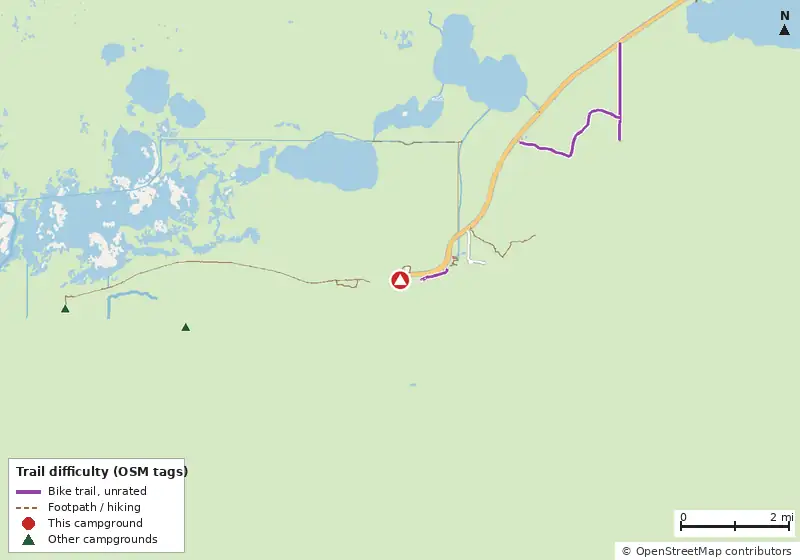 Map of roads, water and trails within about 5 miles of Flamingo Campground, with bike trails colored by their OpenStreetMap difficulty tags