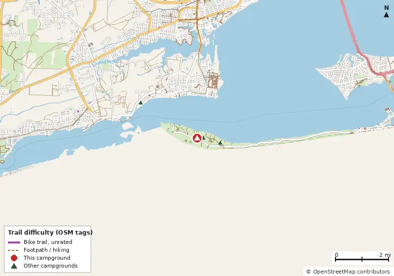 Map of roads, water and trails within about 5 miles of Fort Pickens Group Campground, with bike trails colored by their OpenStreetMap difficulty tags