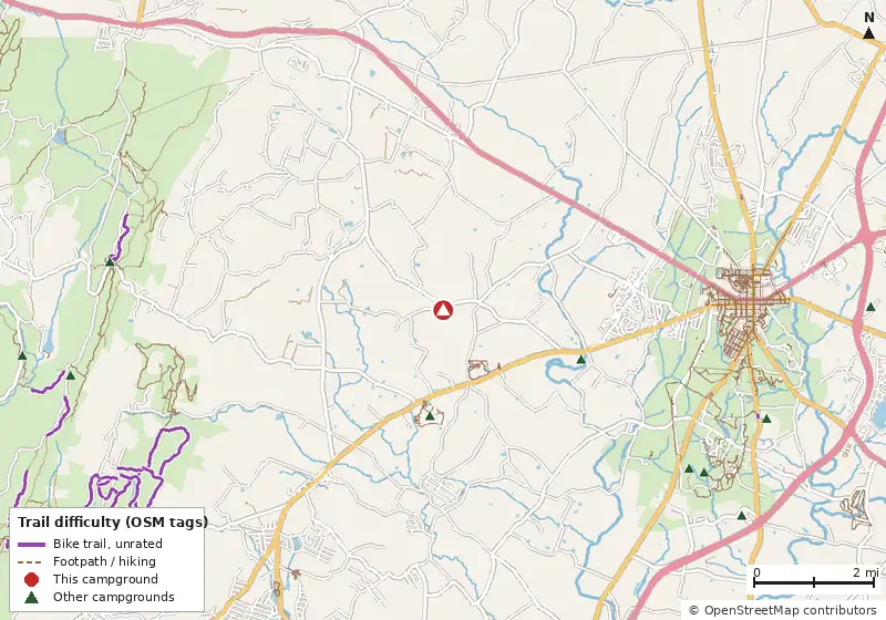 Map of roads, water and trails within about 5 miles of Gettysburg / Battlefield KOA Holiday, with bike trails colored by their OpenStreetMap difficulty tags