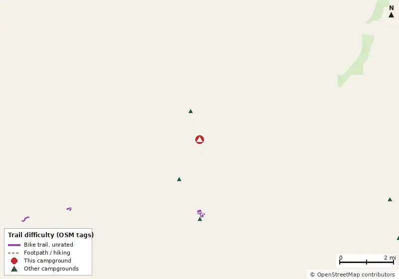 Map of roads, water and trails within about 5 miles of Gulf Waters RV Resort, with bike trails colored by their OpenStreetMap difficulty tags