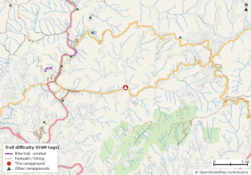 Map of roads, water and trails within about 5 miles of Happy Holiday RV Village, with bike trails colored by their OpenStreetMap difficulty tags