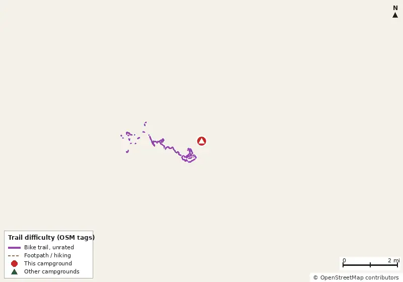 Map of roads, water and trails within about 5 miles of Hard Labor Creek State Park Campground, with bike trails colored by their OpenStreetMap difficulty tags