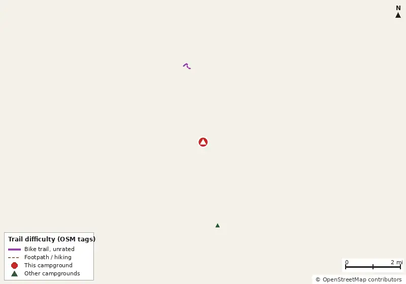 Map of roads, water and trails within about 5 miles of He'e Nalu, with bike trails colored by their OpenStreetMap difficulty tags