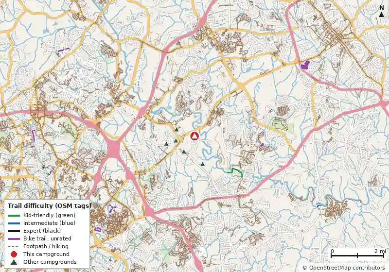 Map of roads, water and trails within about 5 miles of Hellmann's Family Campground, with bike trails colored by their OpenStreetMap difficulty tags