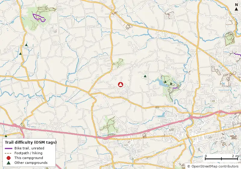 Map of roads, water and trails within about 5 miles of Hidden Acres Campground, with bike trails colored by their OpenStreetMap difficulty tags