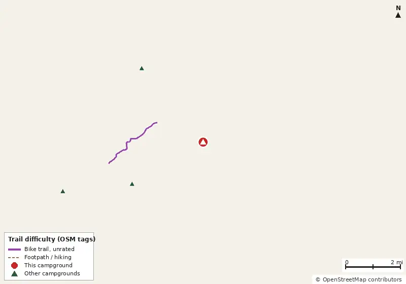 Map of roads, water and trails within about 5 miles of High Springs Campgrounc, with bike trails colored by their OpenStreetMap difficulty tags