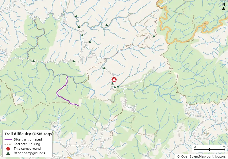 Map of roads, water and trails within about 5 miles of Holder Cove Campground, with bike trails colored by their OpenStreetMap difficulty tags