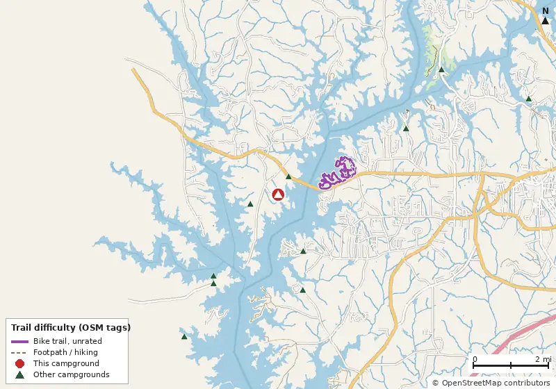 Map of roads, water and trails within about 5 miles of Holiday (Georgia), with bike trails colored by their OpenStreetMap difficulty tags