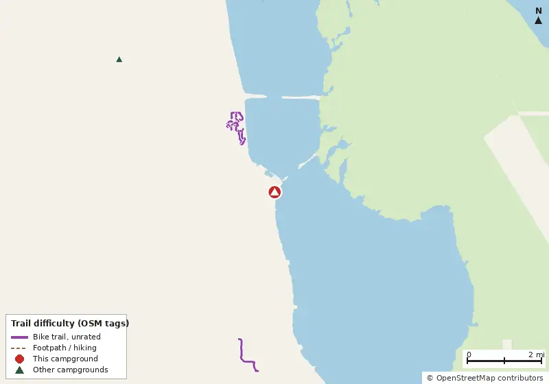 Map of roads, water and trails within about 5 miles of Indian River RV Park, with bike trails colored by their OpenStreetMap difficulty tags