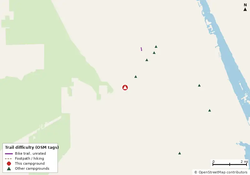 Map of roads, water and trails within about 5 miles of International RV Park, with bike trails colored by their OpenStreetMap difficulty tags