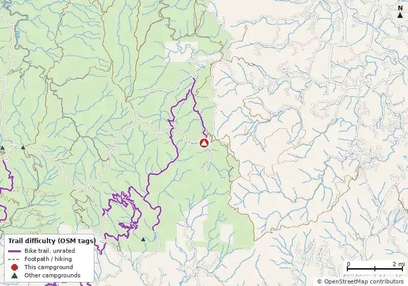 Map of roads, water and trails within about 5 miles of Jacks River Fields Campground, with bike trails colored by their OpenStreetMap difficulty tags
