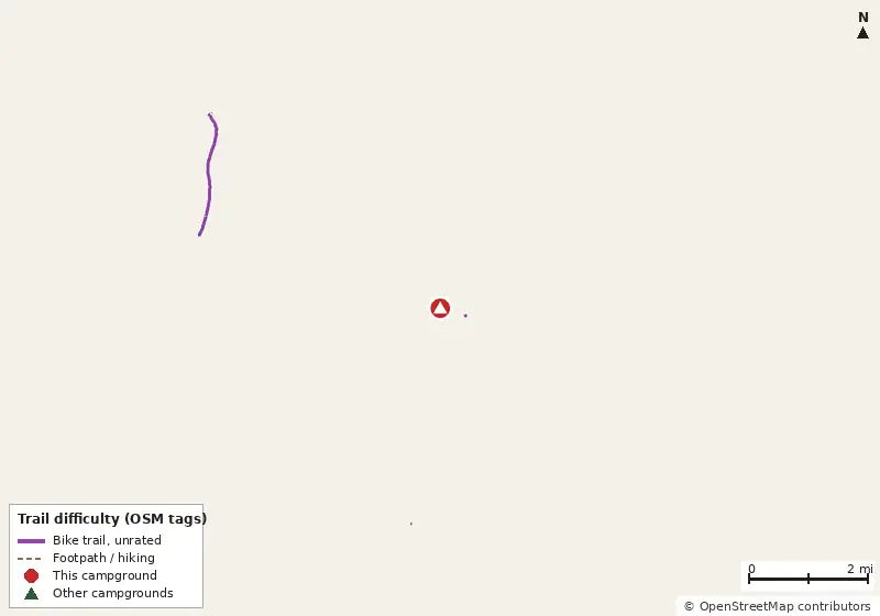 Map of roads, water and trails within about 5 miles of Jekyll Island Campground, with bike trails colored by their OpenStreetMap difficulty tags
