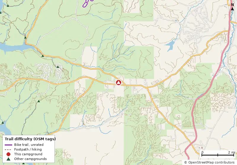 Map of roads, water and trails within about 5 miles of KOA Kampground, with bike trails colored by their OpenStreetMap difficulty tags