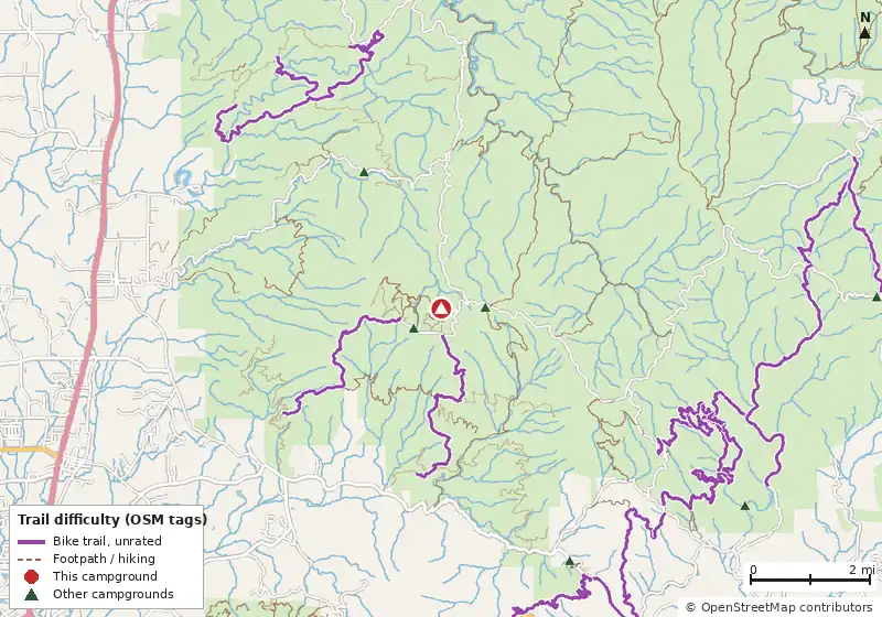 Map of roads, water and trails within about 5 miles of Lake Conasauga Campground, with bike trails colored by their OpenStreetMap difficulty tags