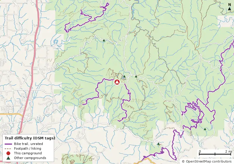 Map of roads, water and trails within about 5 miles of Lake Conasauga Overflow Campground, with bike trails colored by their OpenStreetMap difficulty tags