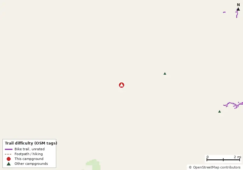 Map of roads, water and trails within about 5 miles of Lake Panasoffkee, with bike trails colored by their OpenStreetMap difficulty tags