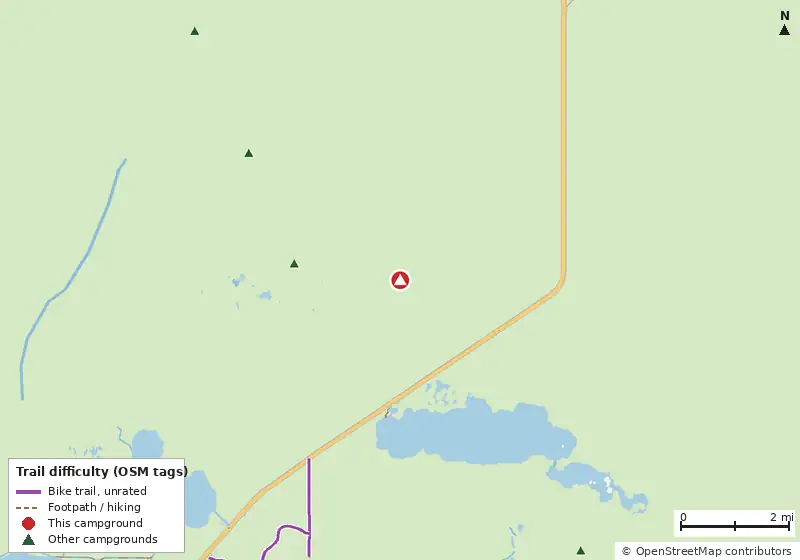 Map of roads, water and trails within about 5 miles of Lard Can Campsite, with bike trails colored by their OpenStreetMap difficulty tags