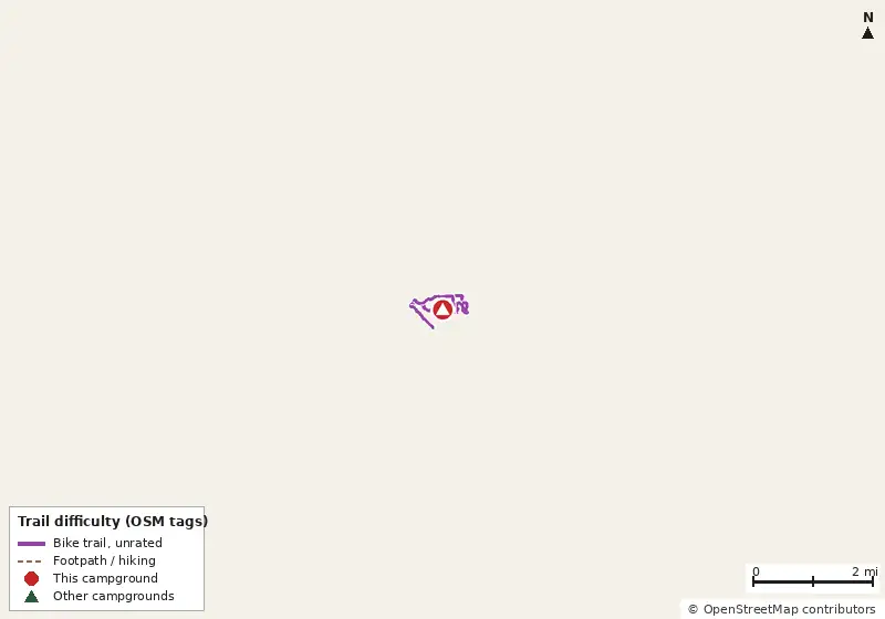 Map of roads, water and trails within about 5 miles of Laura S. Walker State Park Campground, with bike trails colored by their OpenStreetMap difficulty tags