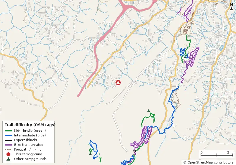 Map of roads, water and trails within about 5 miles of LMFP Campground, with bike trails colored by their OpenStreetMap difficulty tags