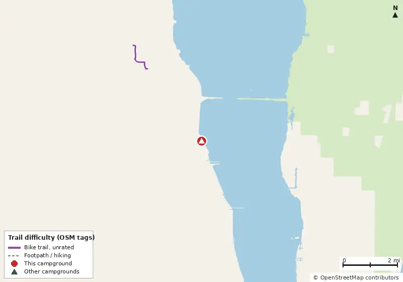 Map of roads, water and trails within about 5 miles of Manatee Hammock Campground, with bike trails colored by their OpenStreetMap difficulty tags